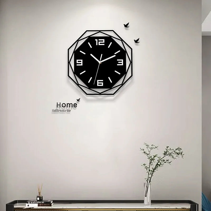 Geometric black wall clock displayed above a console table in a modern living room