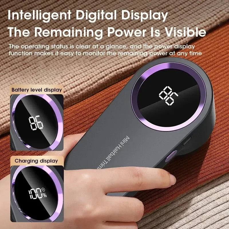 digital display close-up showing battery level of lint remover placed on folded sweaters