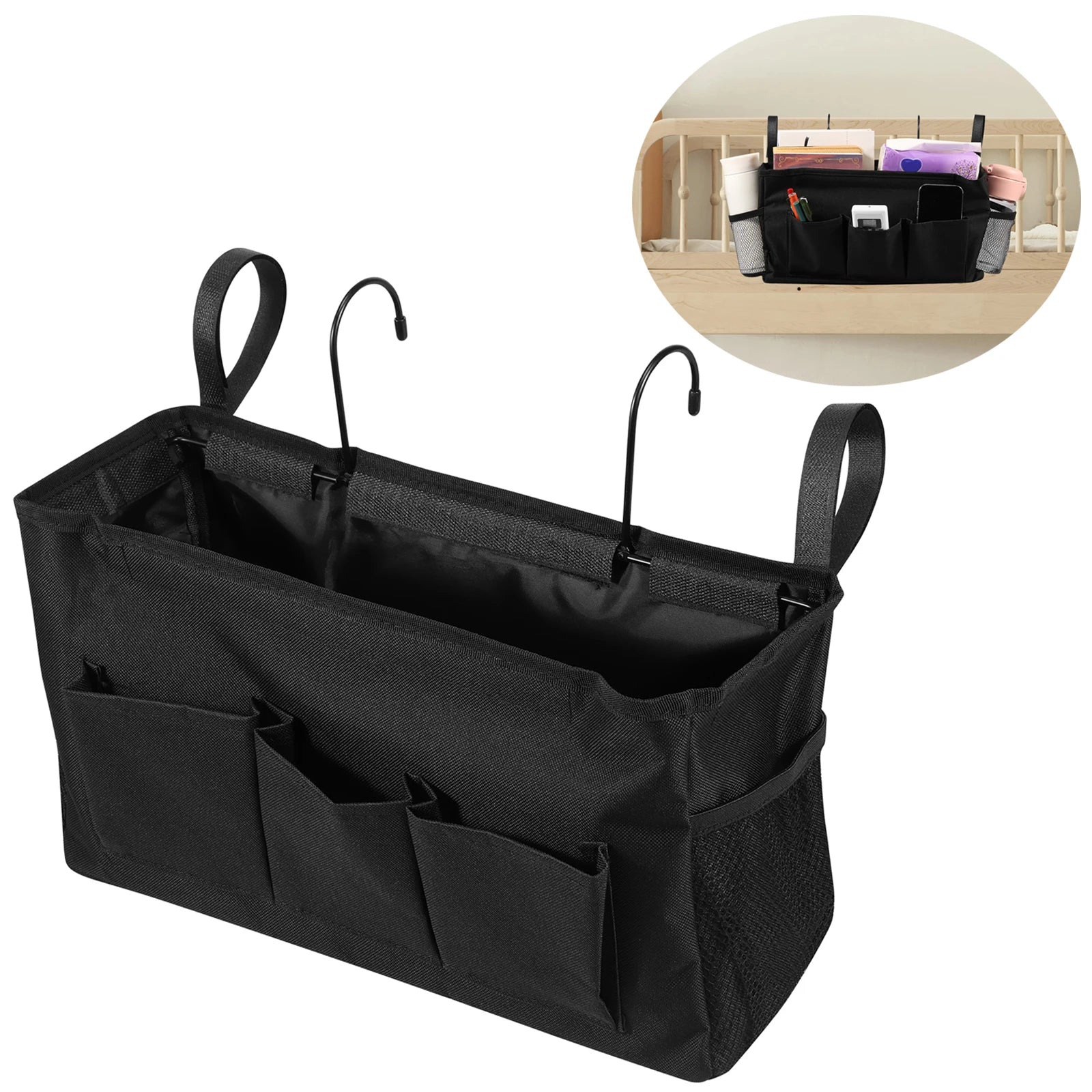 Black Oxford cloth bedside hanging caddy with metal hooks and multiple pockets