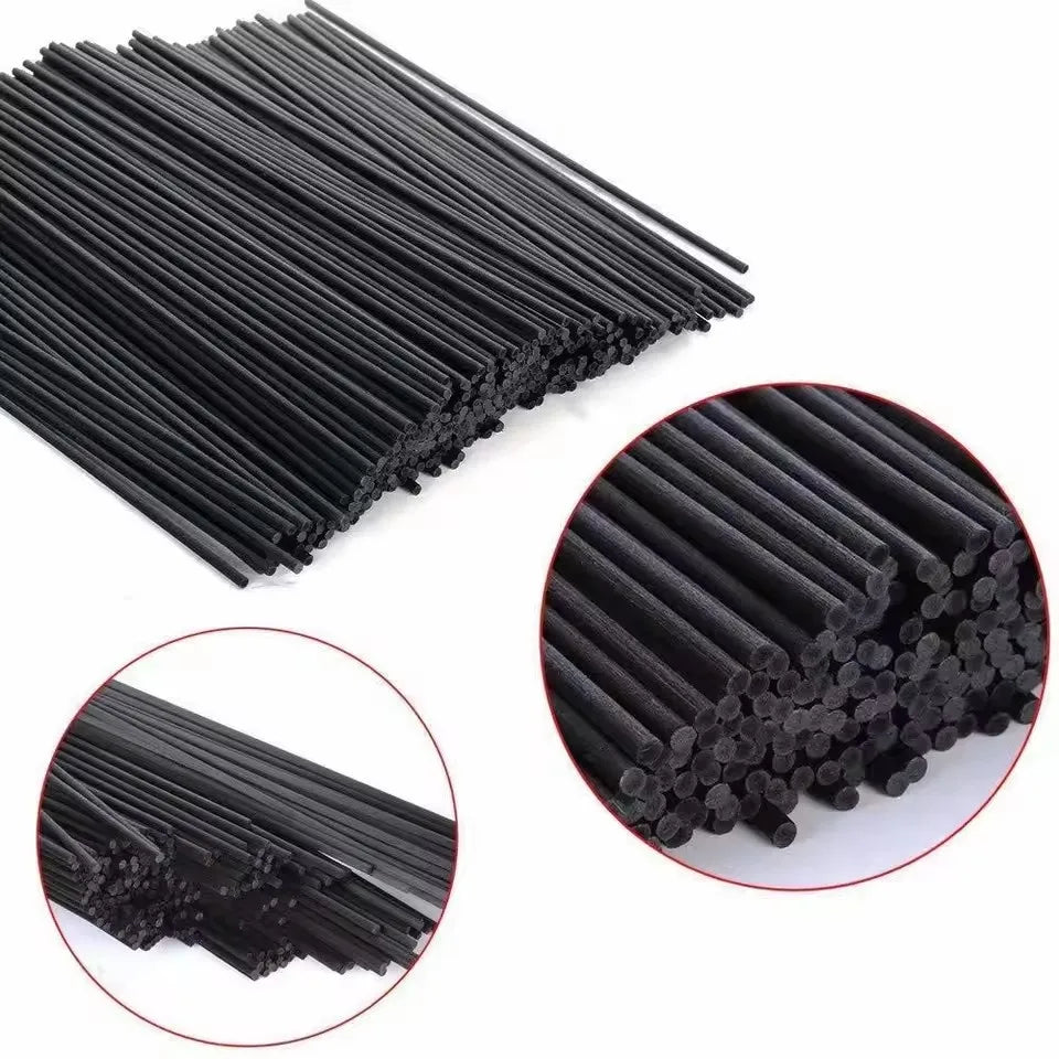Multiple black fiber diffuser sticks displayed with detail in circular closeups