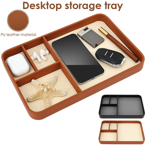 PU leather catchall tray with four compartments holding phone, earbuds, keys, and accessories in brown and black options