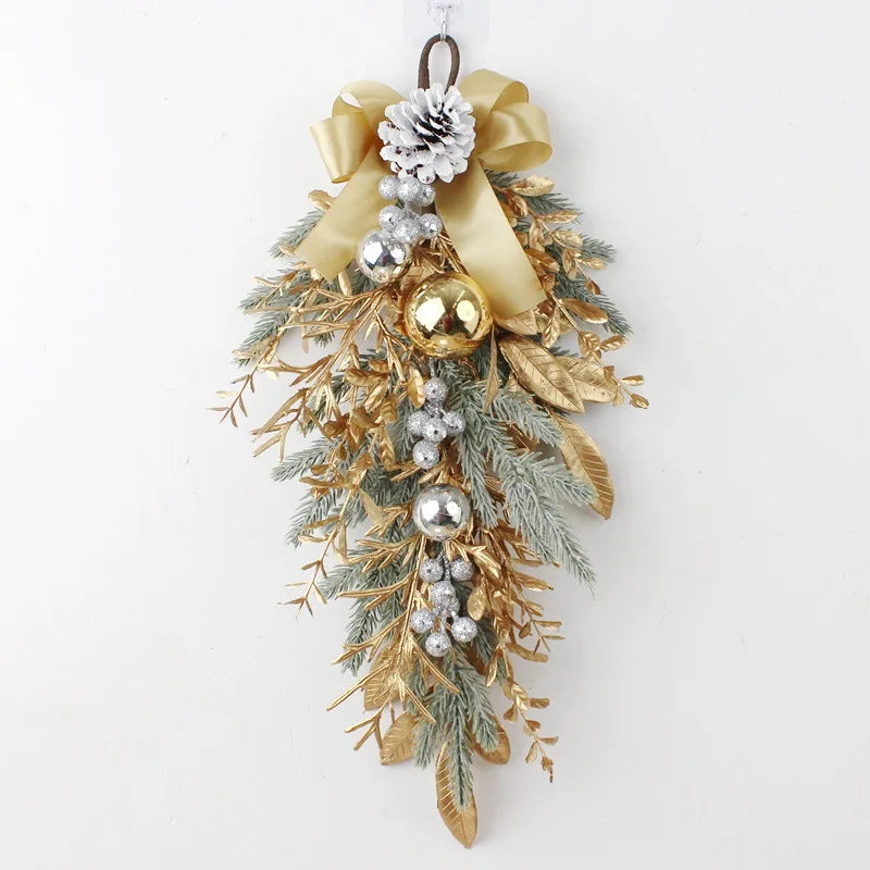 hanging gold and silver pinecone Christmas swag with bow