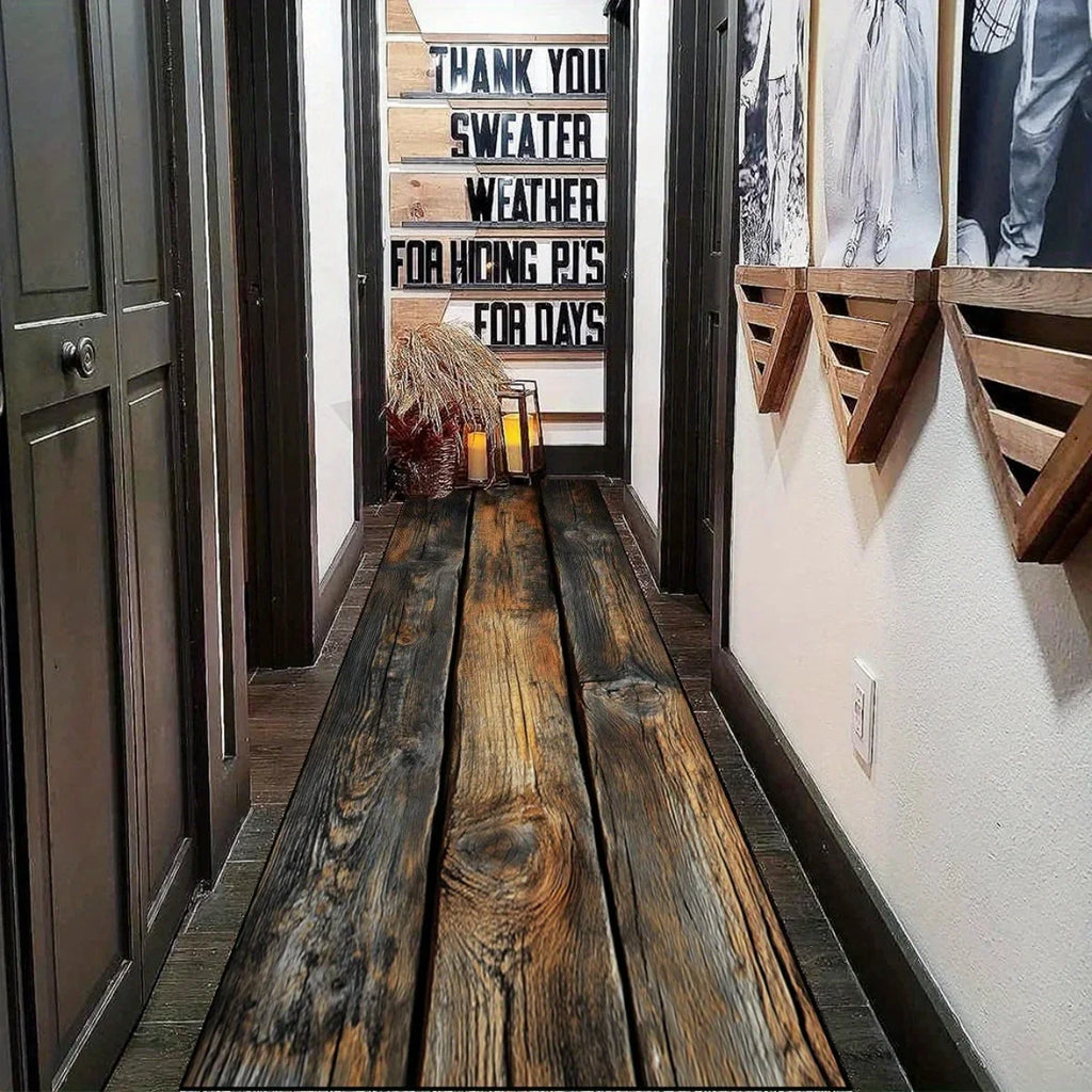 Distressed wood look hallway runner rug adding rustic texture to a cozy hallway with wall decor