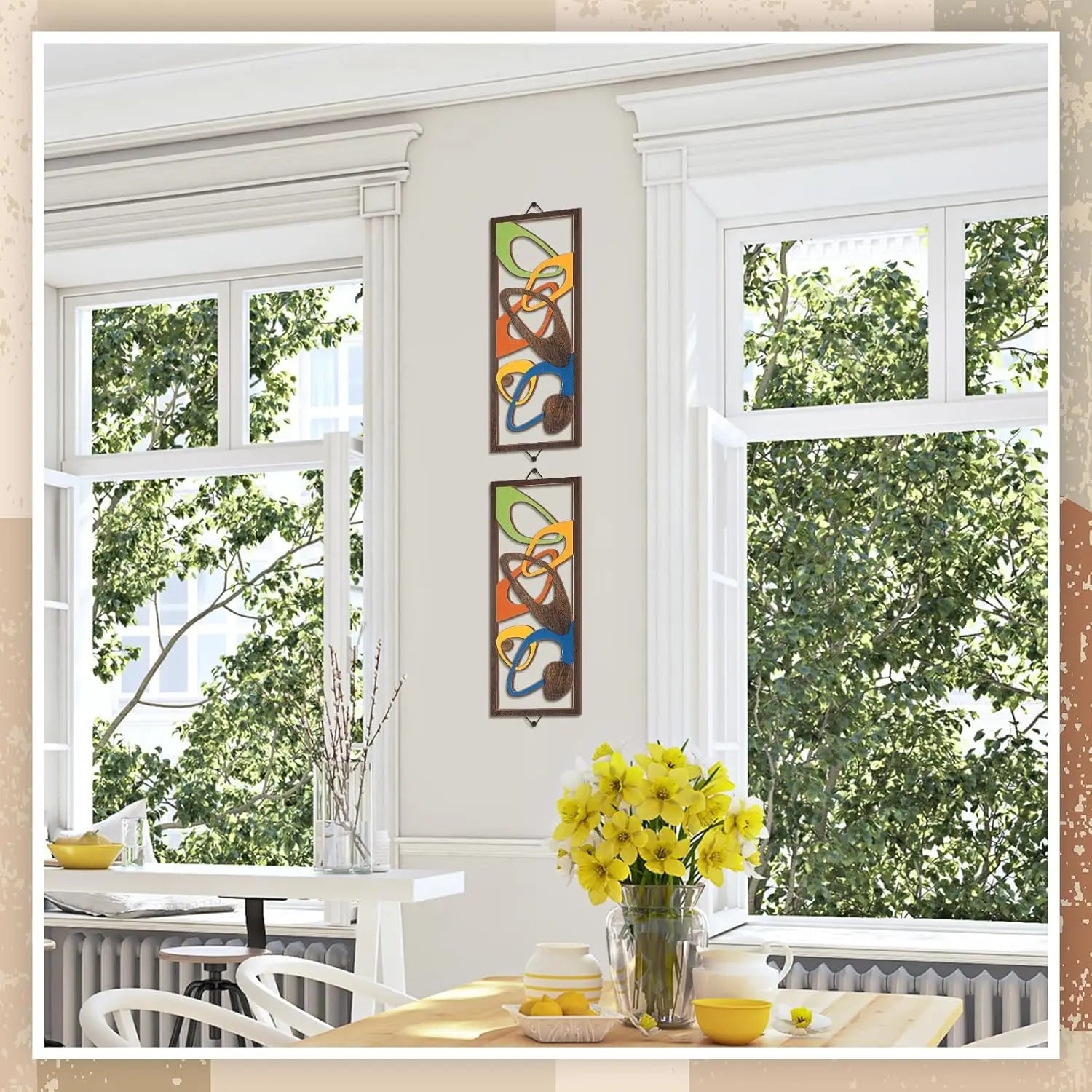Abstract geometric wood wall art panels hanging vertically near bright windows in a dining nook