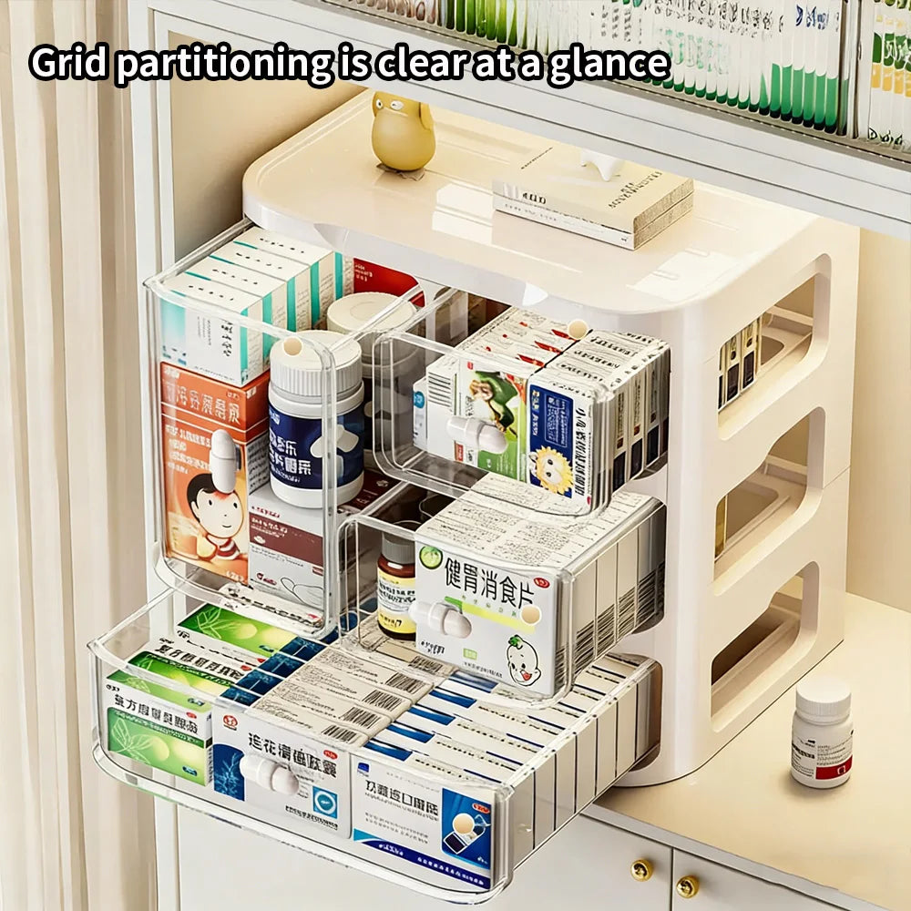 Top view of open drawer medicine organizer showing several compartments and medicine boxes