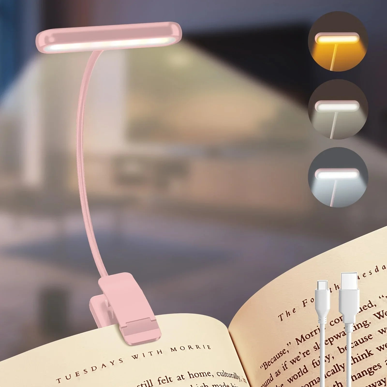 Pink clip-on reading lamp with adjustable neck, cable, and selectable color temperature, clipped to an open book.