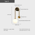 Soren Globe Glass Wall Sconce – Gold Modern Bedroom & Living Room Light