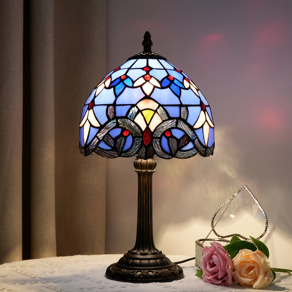 Baroque stained glass lamp illuminated in evening light