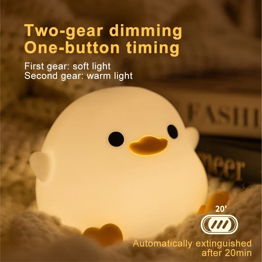 Duck night light with text showing two dimming modes and timer function