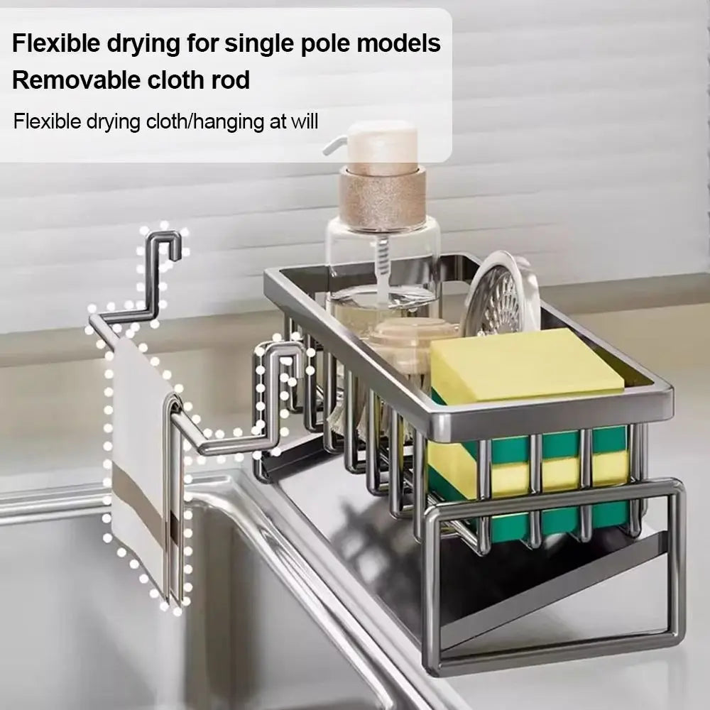 removable cloth rod on a stainless steel sink rack showing flexible towel drying feature with kitchen sponges and cleaning accessories