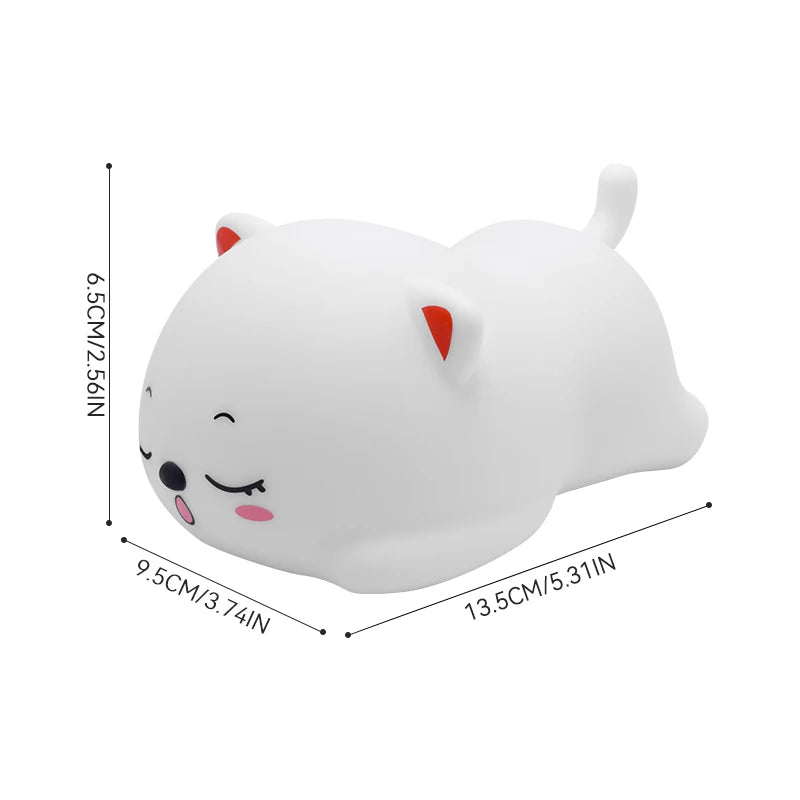 dimensions of snoring cat night light shown with measurements in centimeters and inches