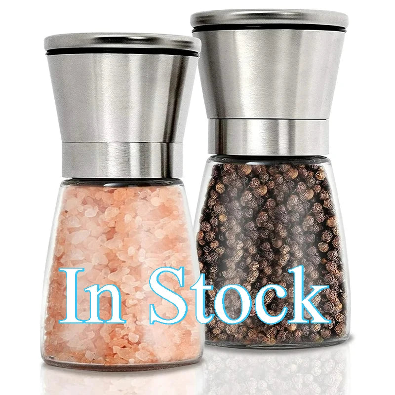 stainless steel and glass salt and pepper grinder set filled with Himalayan salt and peppercorns