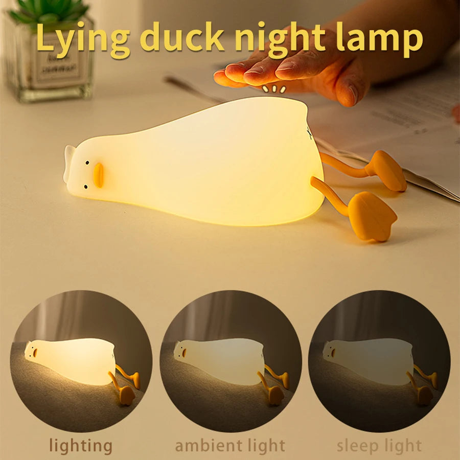Lying duck silicone night lamp with modes for lighting, ambient light, and sleep light