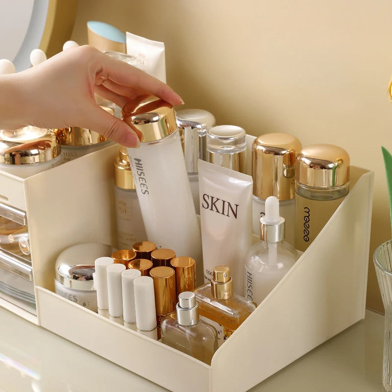 Hand placing a bottle in a beige compartment organizer for skincare