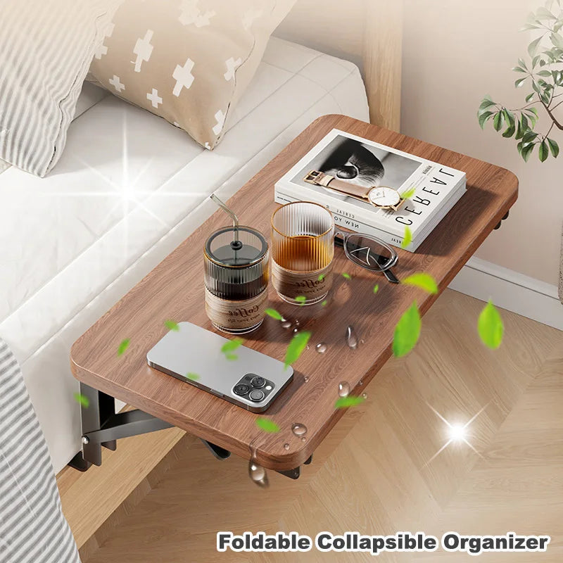 Foldable bedside table with modern brown finish clipped onto bed frame