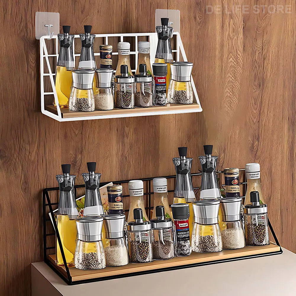 White and black metal and wood wall-mounted shelves used for spice and bottle storage in a kitchen