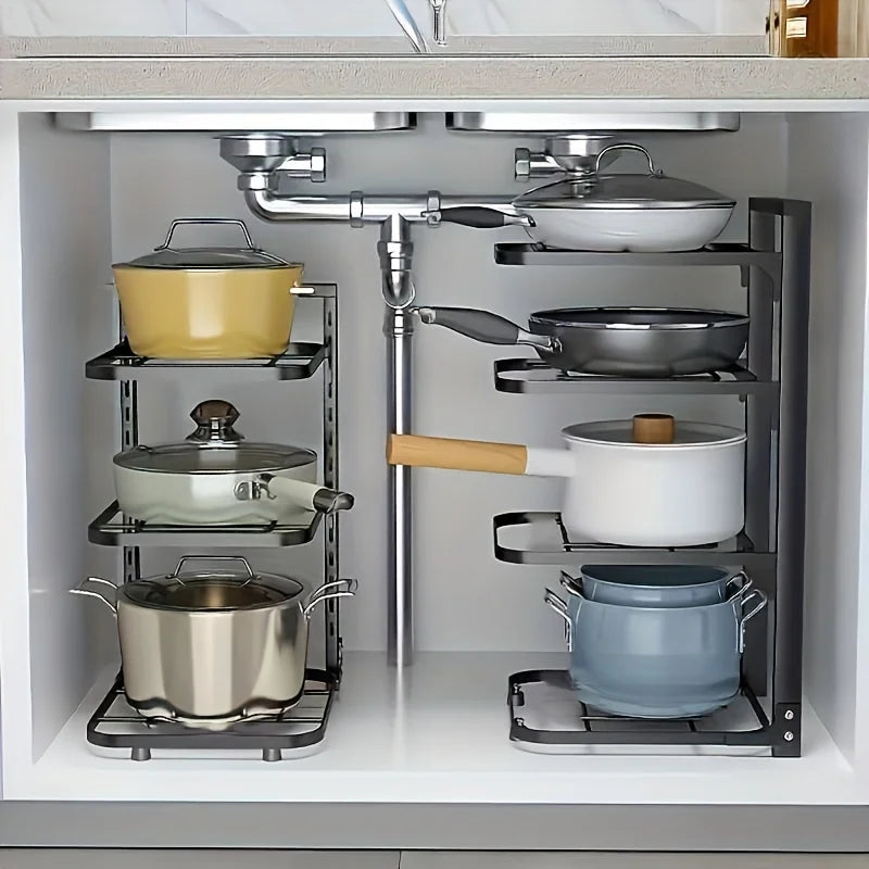 adjustable steel pot and pan rack with cookware organized in a kitchen cabinet