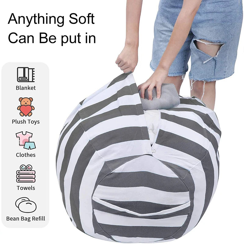 Closeup of striped toy storage bean bag being filled with a blanket, with icons for soft items