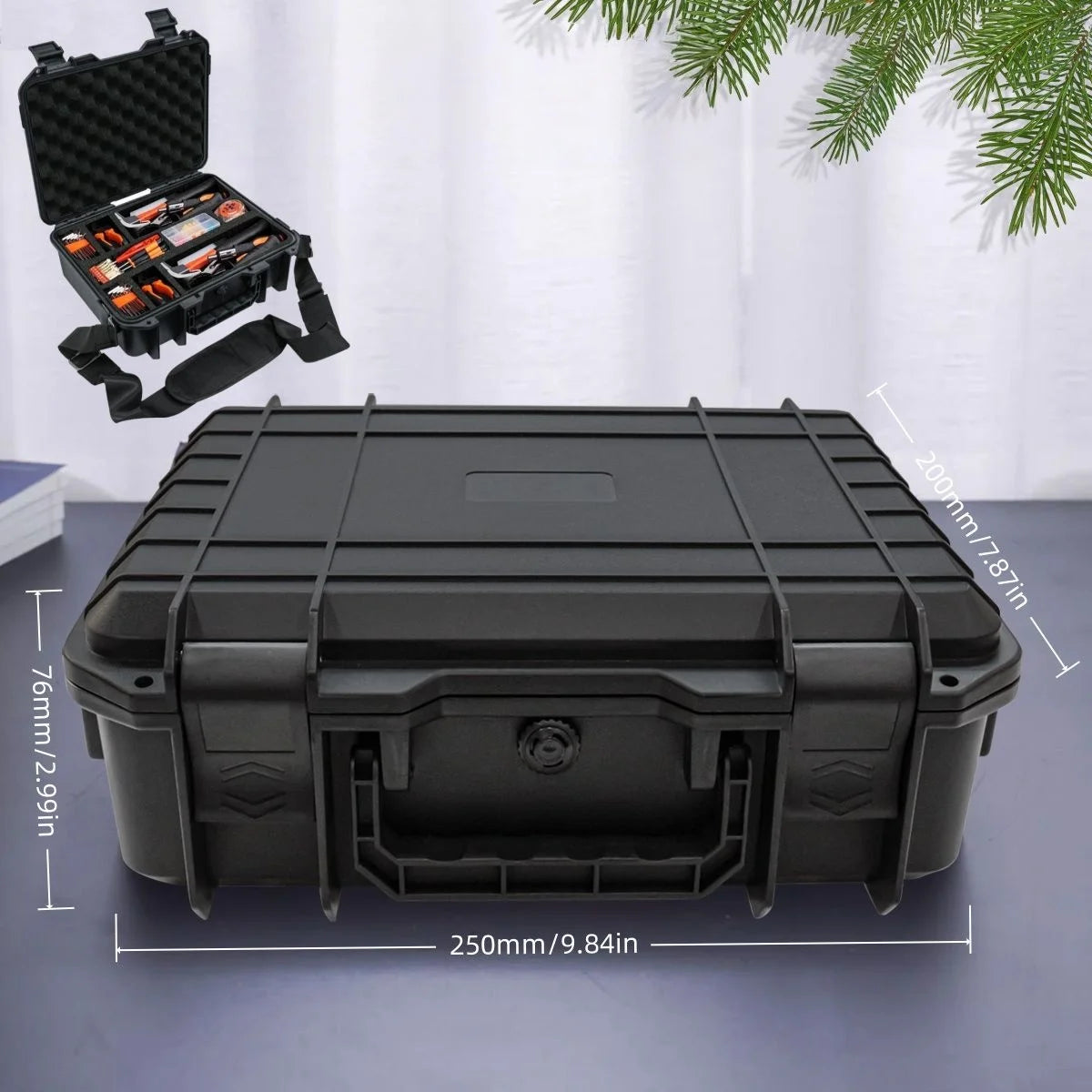 Black waterproof hard-shell storage case with dimensions shown, on table