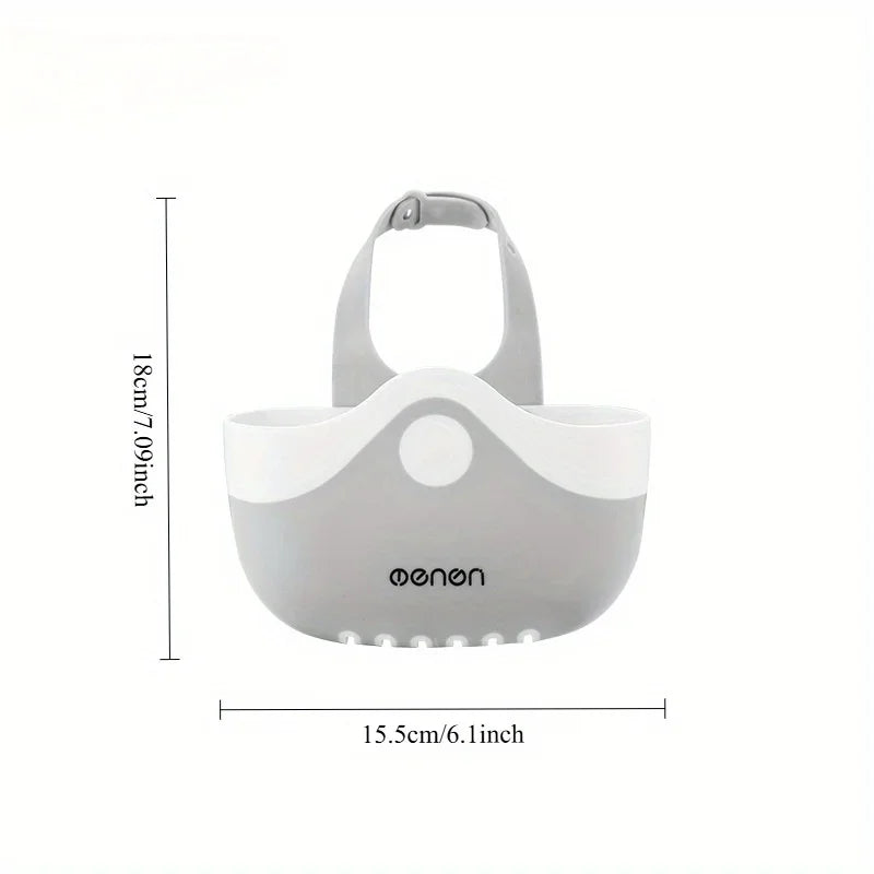 Gray and white sink caddy basket with adjustable strap and labeled measurements on a white background