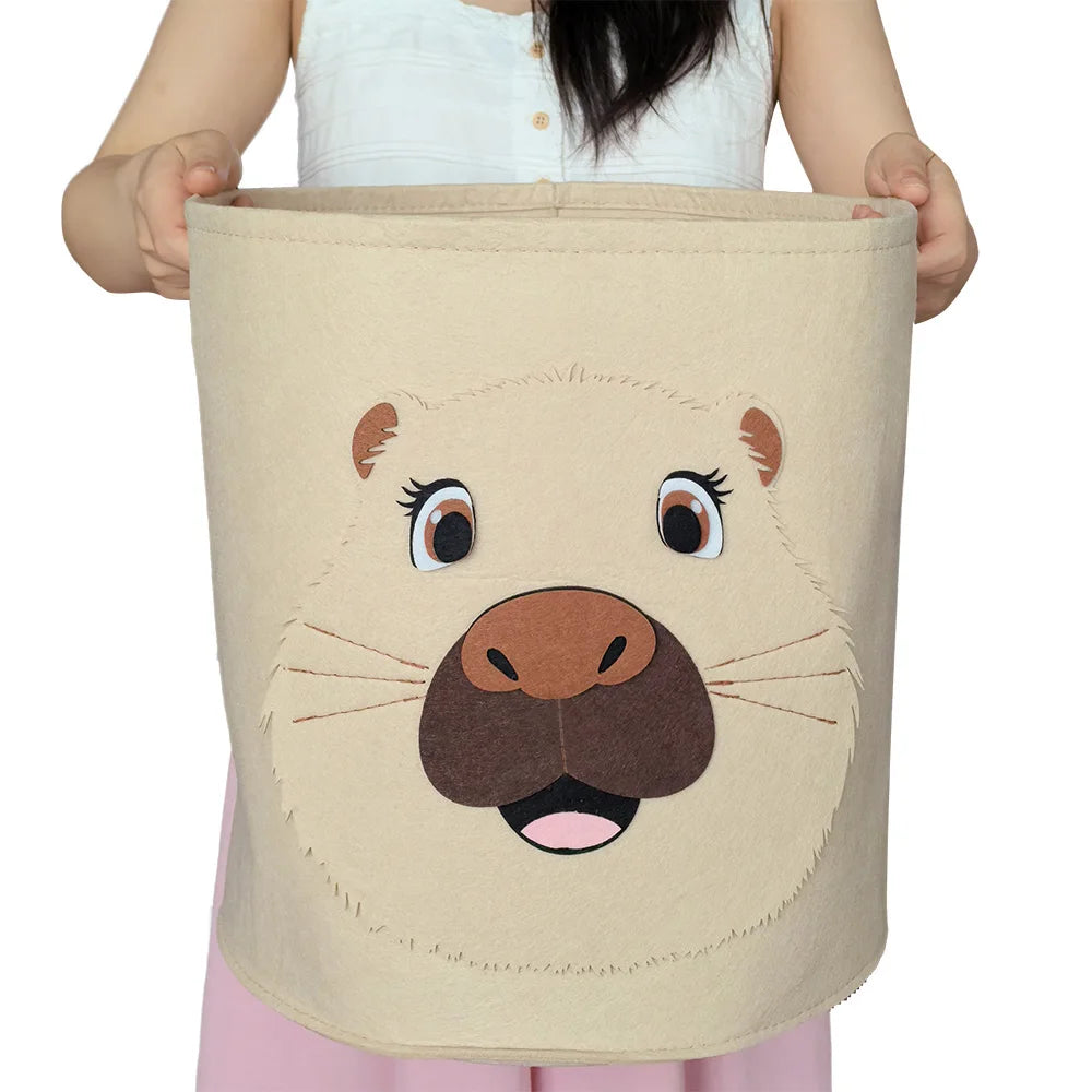 Person holding large cotton basket with capybara face