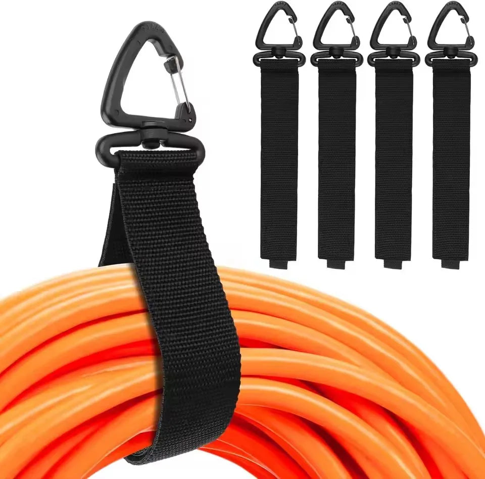 Rotating buckle cord organizer straps holding orange extension cord and shown as a set for garage storage