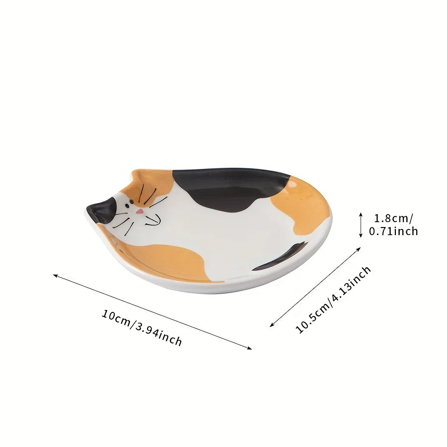Side view of ceramic cat face spoon rest with dimensions labeled