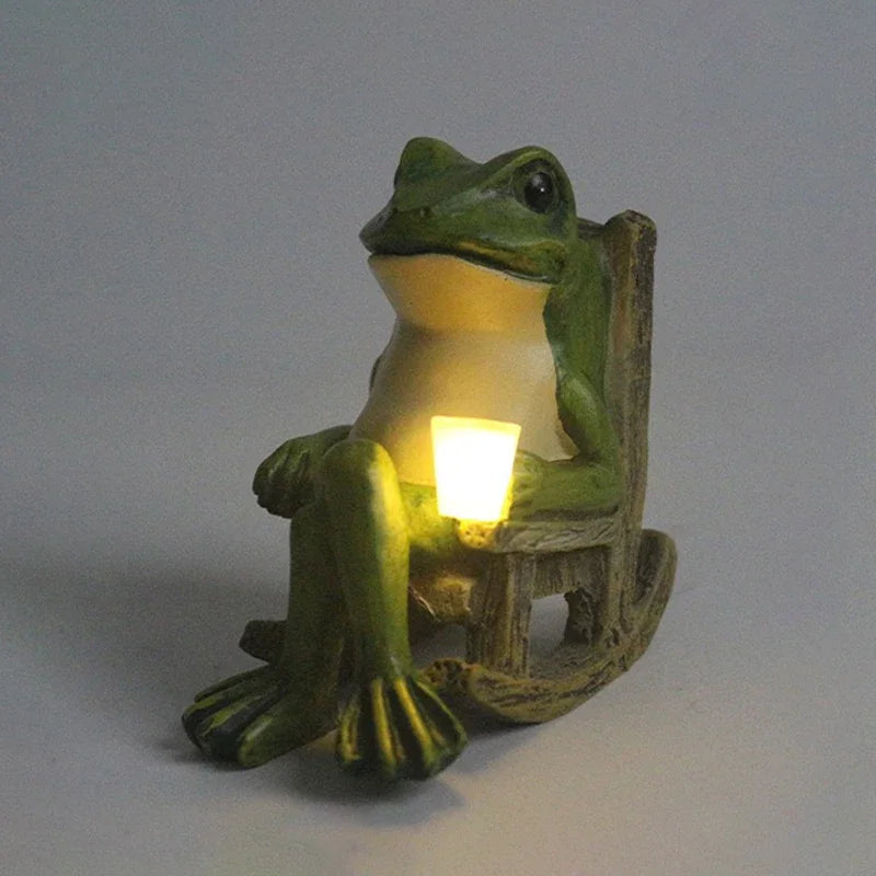 resin frog ornament with softly glowing LED cup