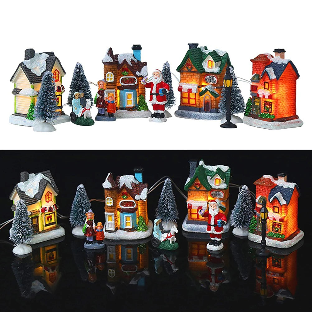 LED lighted Christmas village set with miniature houses, trees, and holiday figurines displayed on white and black backgrounds