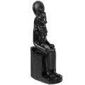 Black resin Egyptian goddess figurine with lioness features seated on a small pedestal