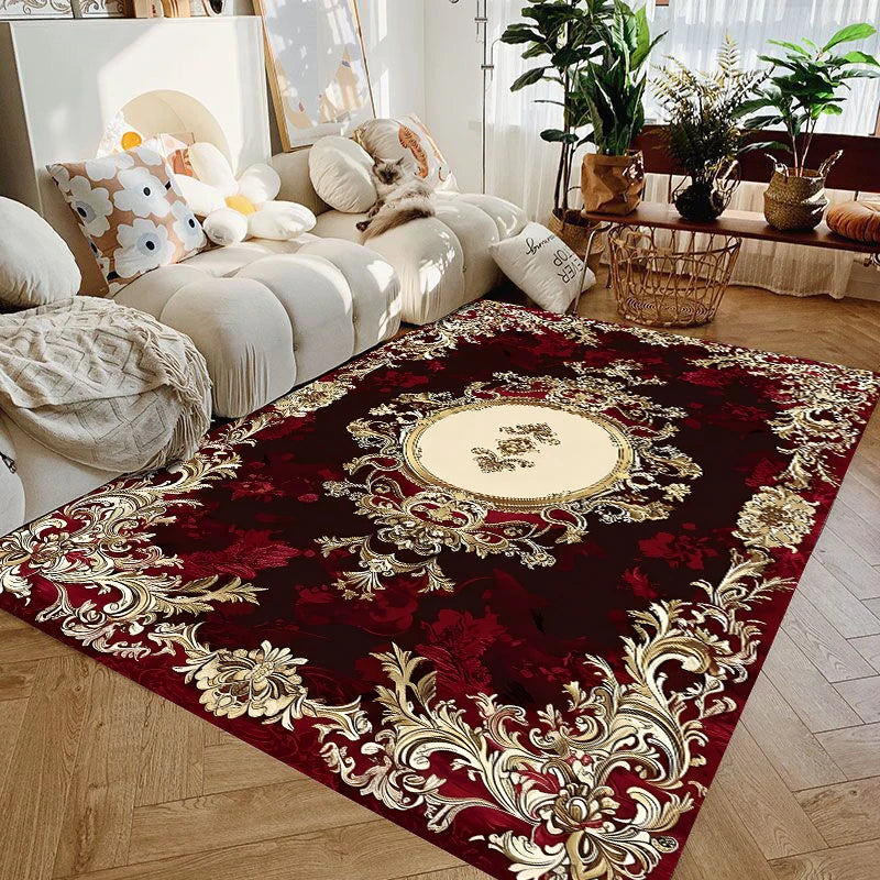 burgundy and gold baroque medallion area rug in a bright living room under a white sofa and decorative pillows