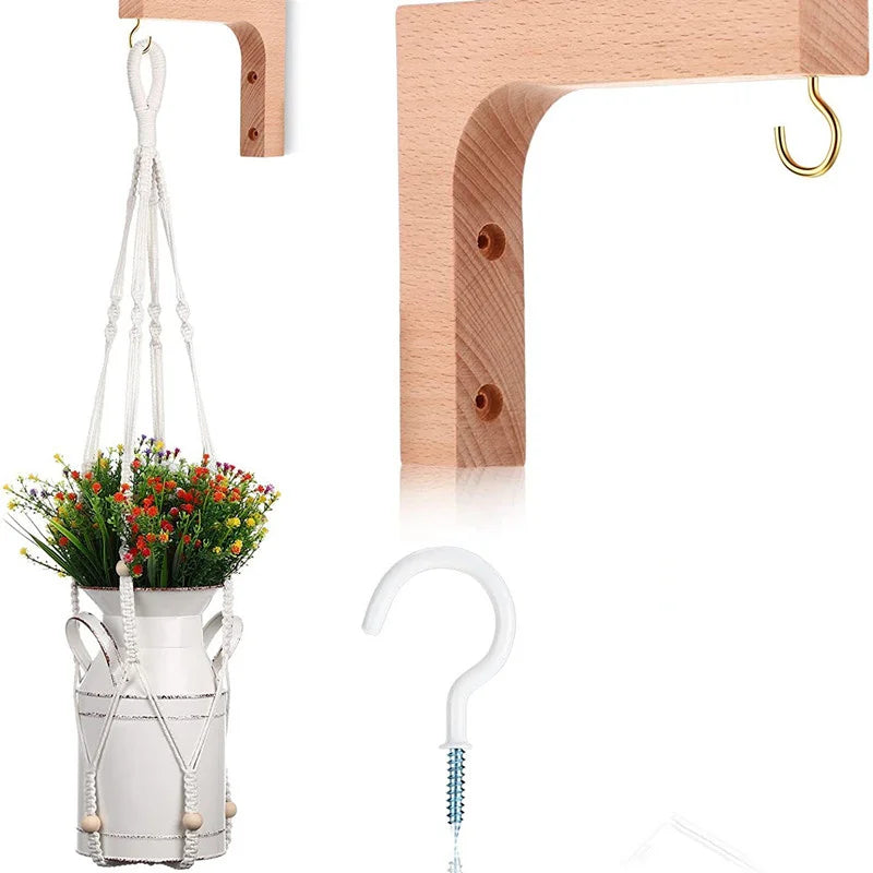 Wood wall plant bracket with white hanging pot and decorative rope
