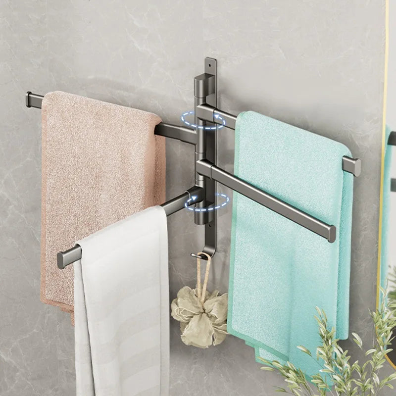 Multi-bar towel rack with four arms in use with towels and bath pouf
