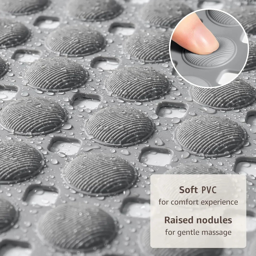 Close-up of the textured PVC surface of the bath mat with raised nodules and water droplets