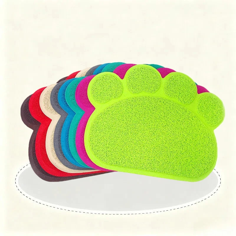 Fan arrangement of multi-colored paw print cat litter mats