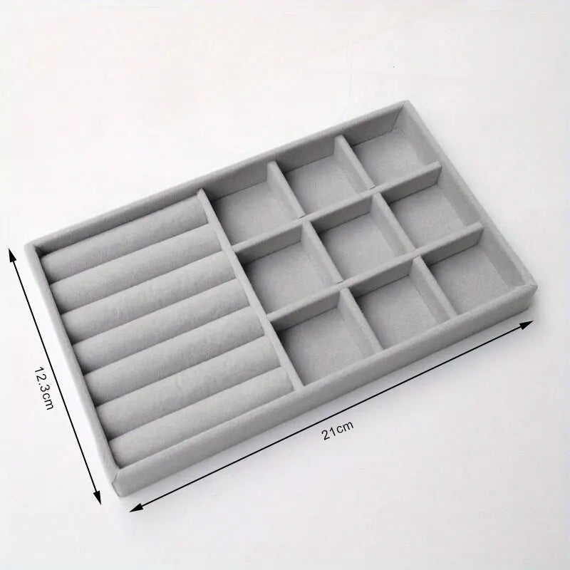 Grey velvet mixed-section jewelry tray with ring rolls and compartments, shown with labeled measurements