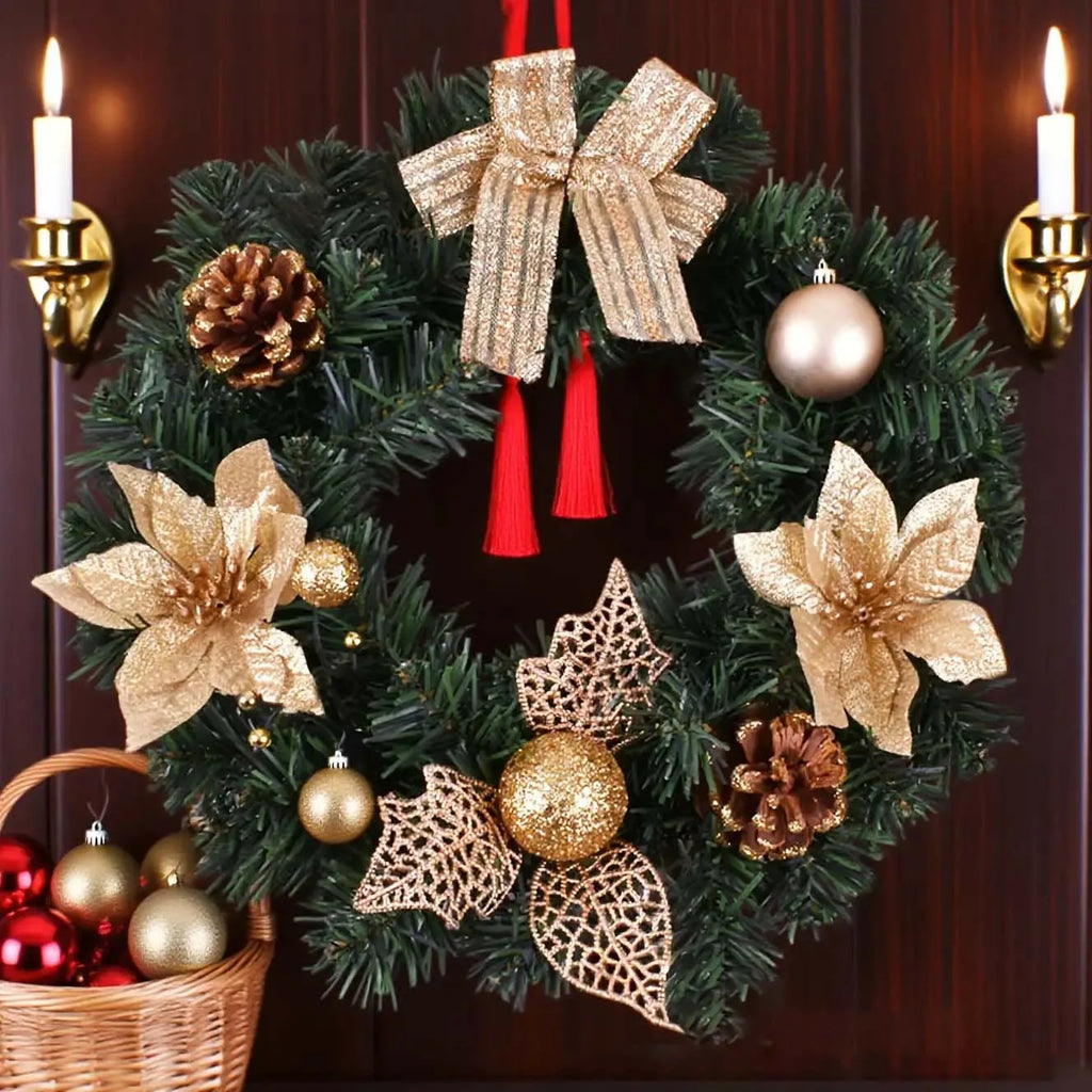 gold lighted wreath with ornaments and bow on dark wood door
