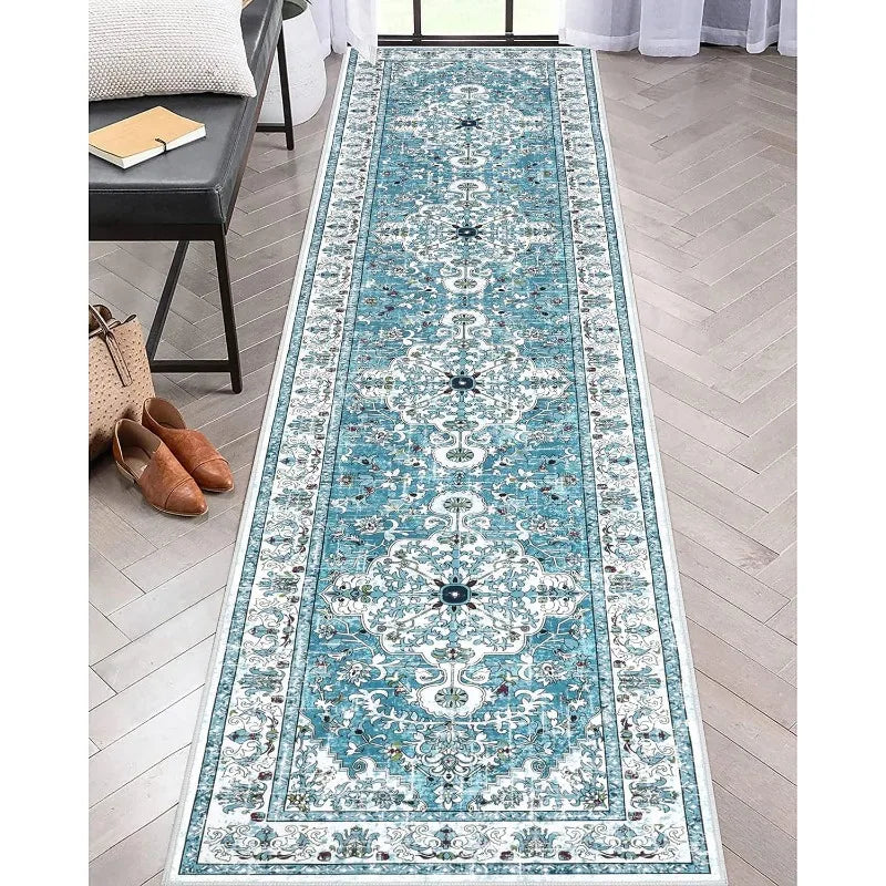 Blue and white boho geometric hallway runner rug in entryway with bench and shoes