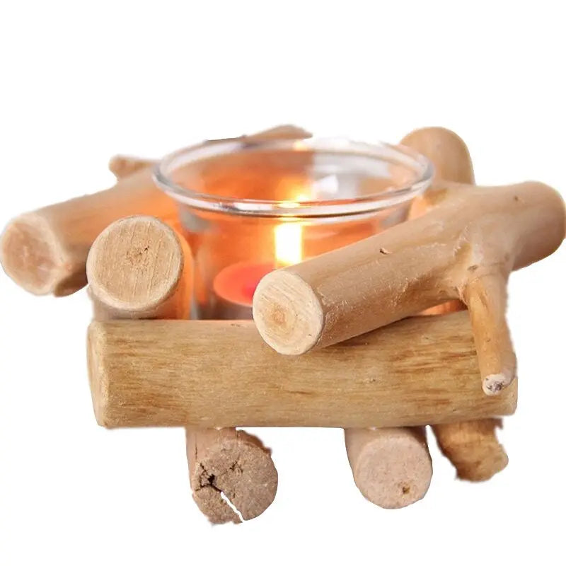 Close-up of rustic driftwood and glass tealight holder