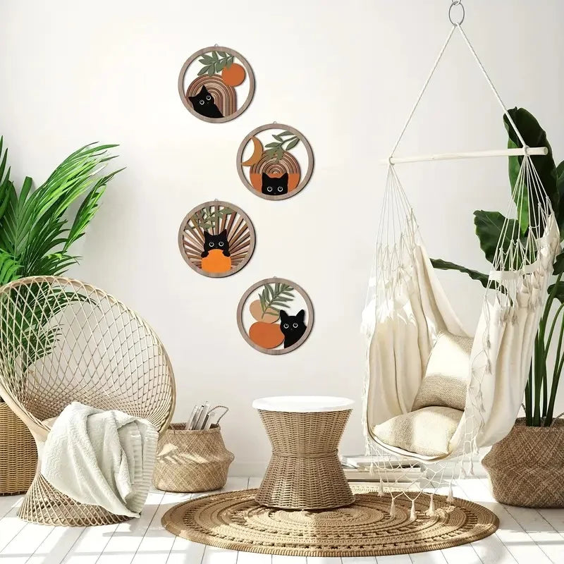Boho cat wooden wall art set in a bright sunroom with hanging chair and rattan furniture