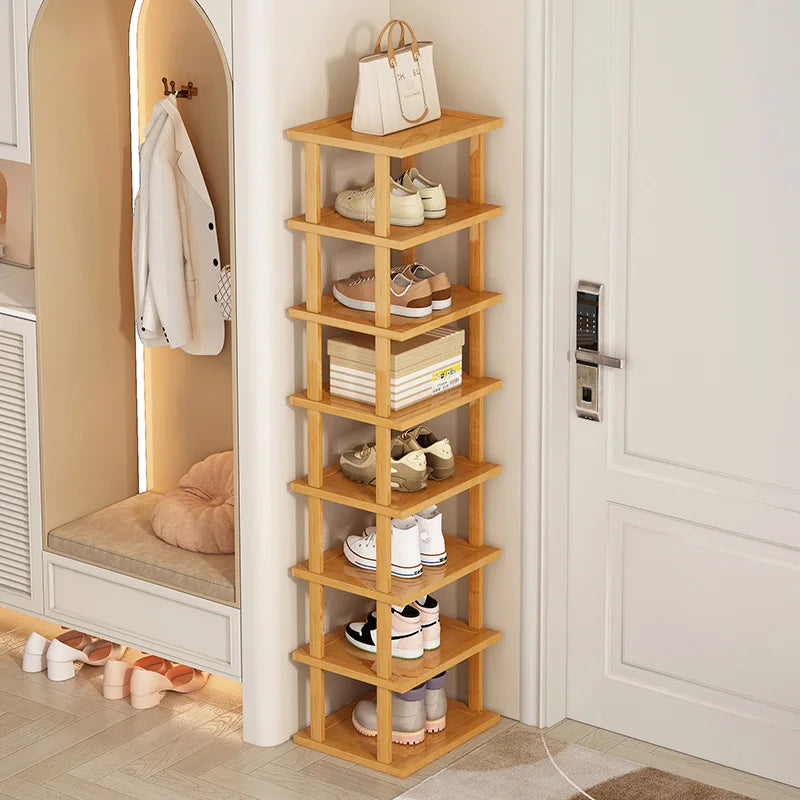 tall narrow bamboo shoe rack fitting into a small entryway corner
