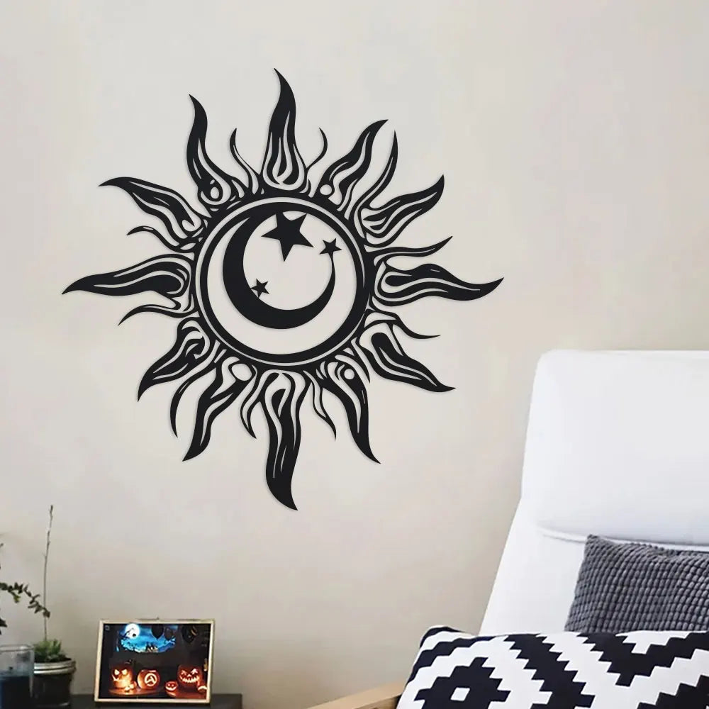 Decorative iron sun wall art on a pale wall behind a lounge chair
