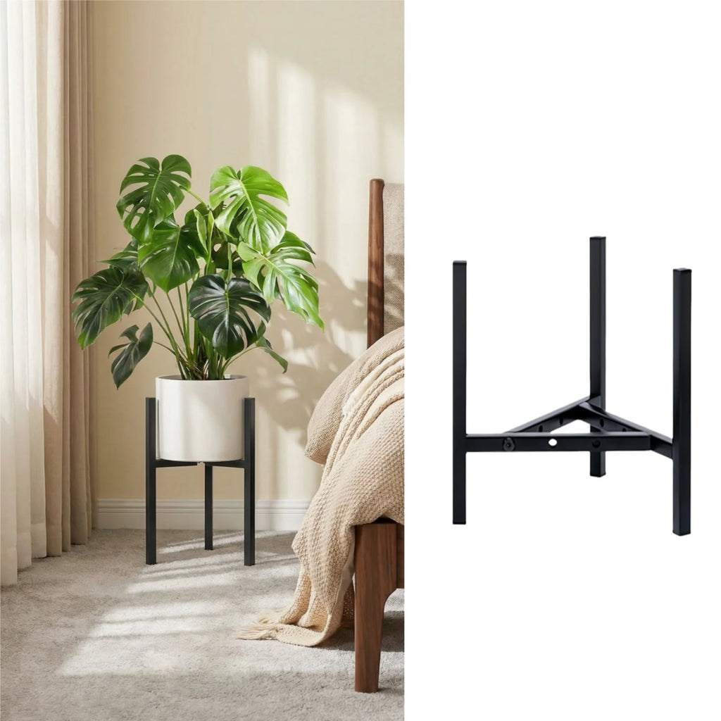 Black metal plant stand in a bedroom corner holding a large white planter