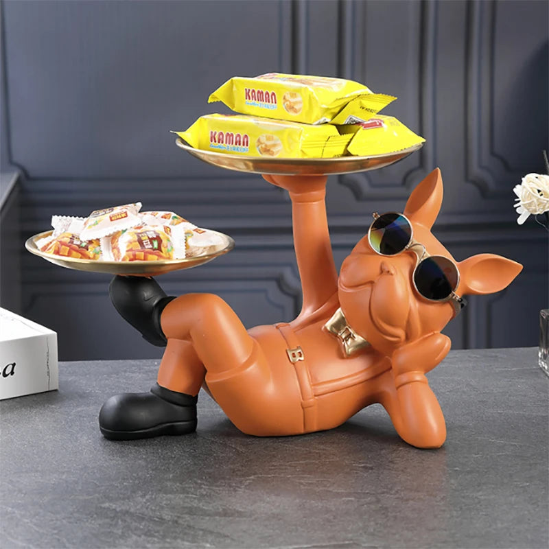 Orange bulldog tray sculpture with sunglasses and two trays, snacks displayed on trays