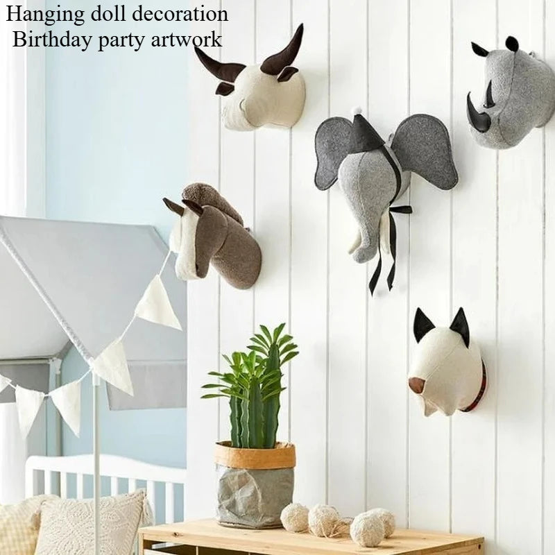 Soft fabric animal head wall mounts in nursery and kids' room displayed on white vertical wood paneling