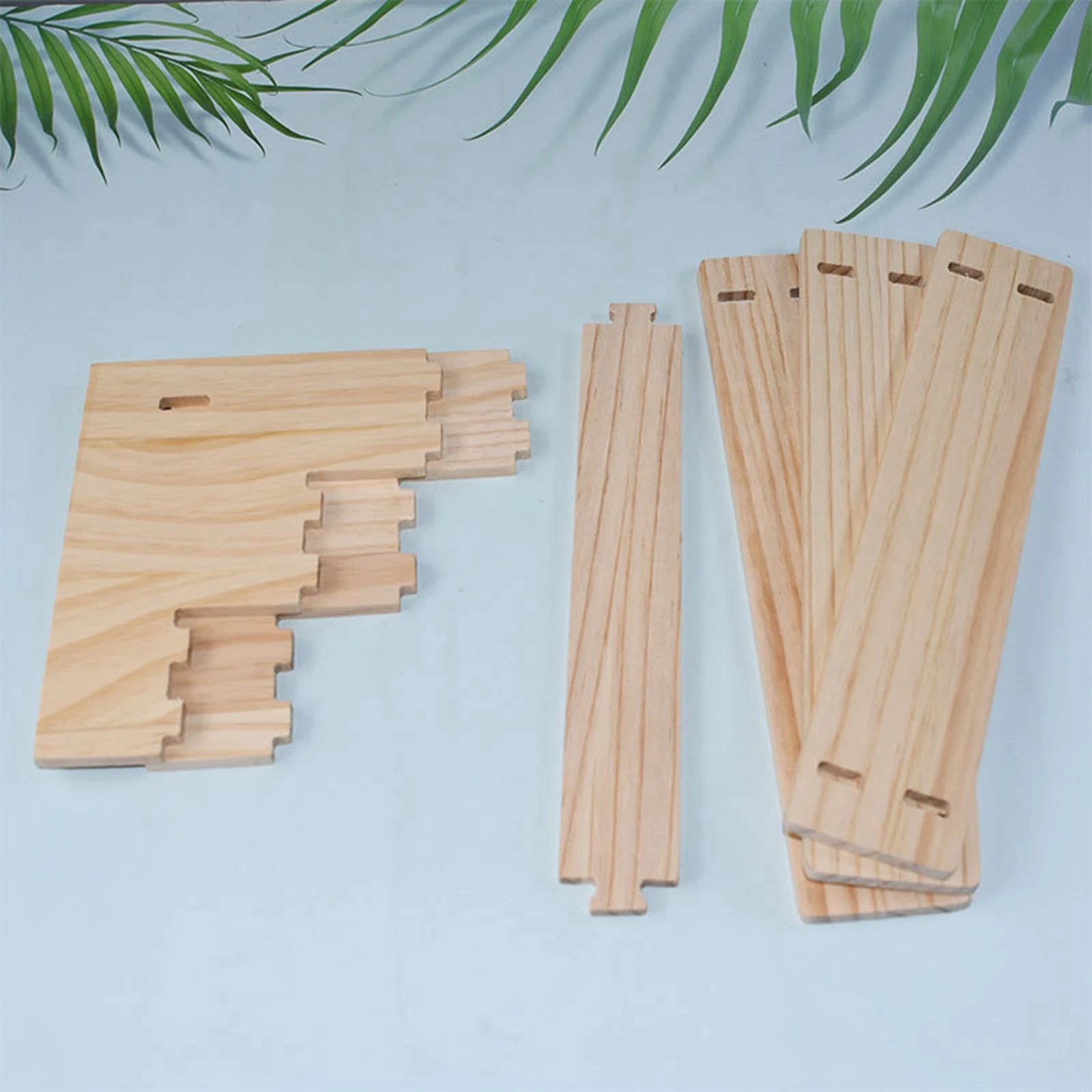 Unassembled wooden riser shelf parts laid out on table