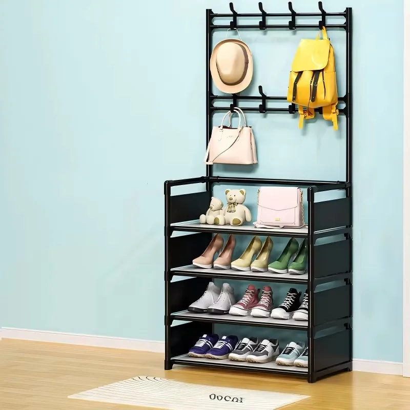 Three-shelf black entryway rack with hooks, showcasing storage for shoes, hats, bags, and toys in a modern room