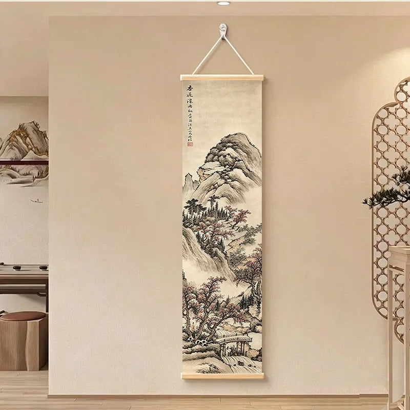 Single framed Japanese landscape ink scroll hanging in a minimalist entryway