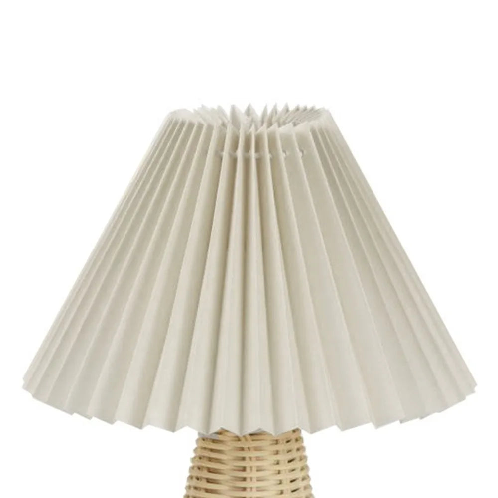 Close-up of pleated beige fabric lampshade, detail of folding pattern