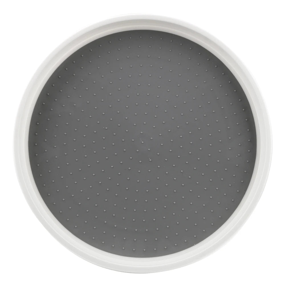 Top view of round white and gray turntable organizer with non-slip textured surface